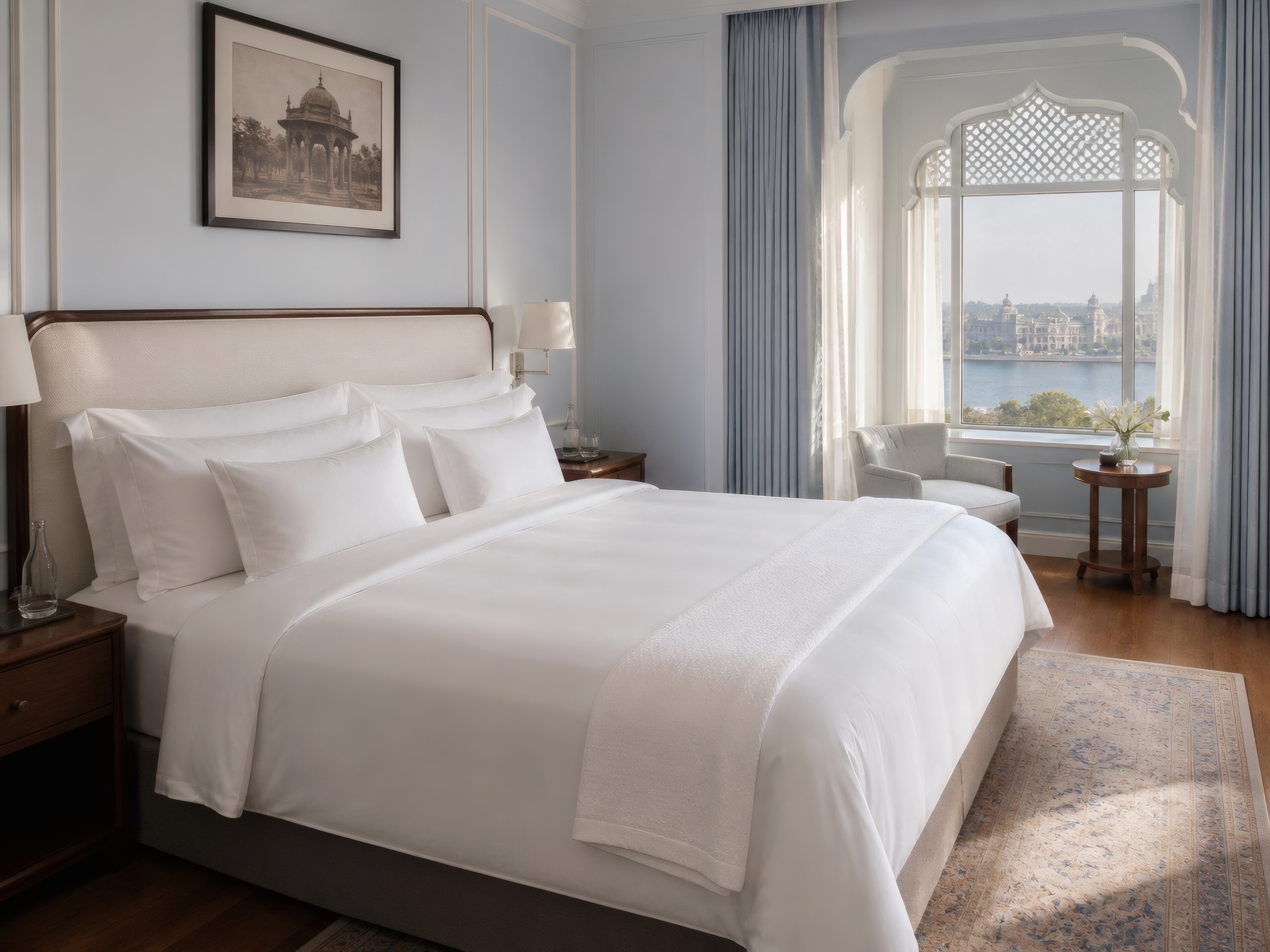 A five-star hotel suite with crisp white bed linen